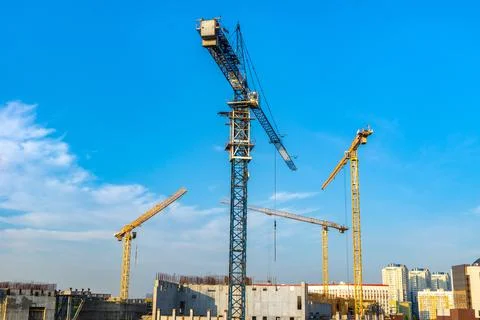 Complex construction of monolithic frame structures using tower cranes Stock Photos