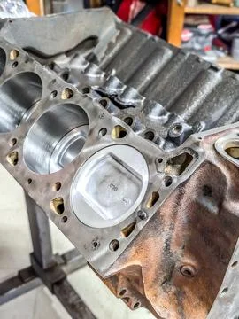 Complex engine work in auto shop Stock Photos
