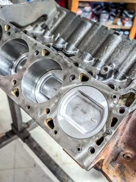 Complex engine work in auto shop Stock Photos
