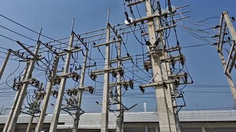Complex high voltage electrical distribution substation switchyard mounted. Stock Photos
