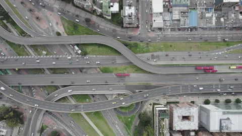 Complex highway interchange in Bogota Colombia during daytime, top down drone Stock Footage 304506606