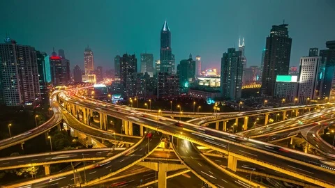 Complex highway interchange in Shanghai, China, at night. Vídeos de archivo 82302654