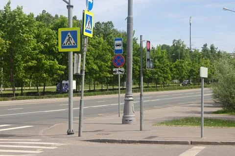Complex intersection, street crossing, road signs and greenery 2 Stock Photos