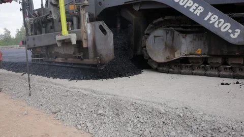 Complex linear road construction machine. Stock Footage 230156965