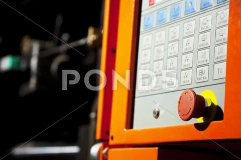 Complex machine control panel with big stop button Stock Photos