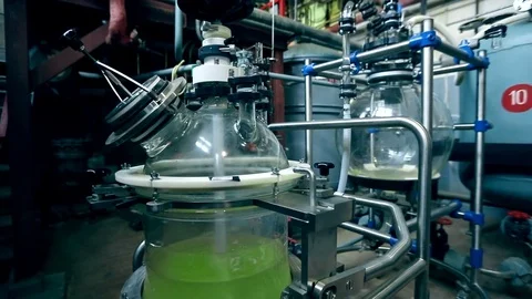 A complex machine that cooks poison Stock Footage 73698354