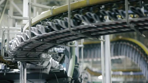 Complex machine spewing newspaper copies to the waiting distribution division Stock Footage 195614257