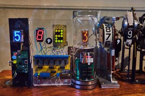 Complex mechanical timer with varying rotating numbers counting upward 写真素材