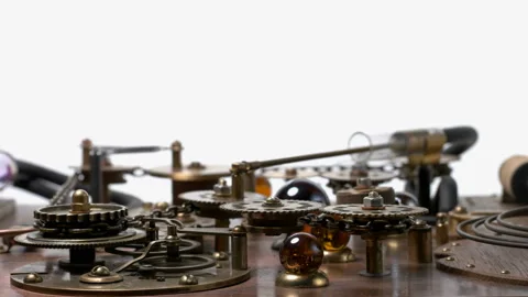 A complex mechanism with many rotating gears, chain, piston, cogs. Very similar Stock Footage 119315749