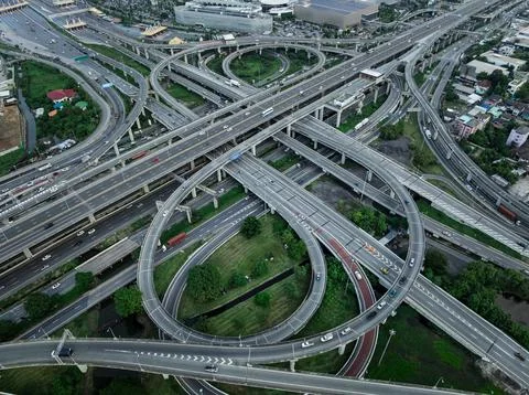 Complex Multi-level Highway Interchange With Traffic Flow High Angle View Stock Photos