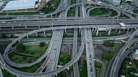 Complex Multi-level Highway Interchange With Flowing Vehicle Traffic In Urb.. Stock Photos