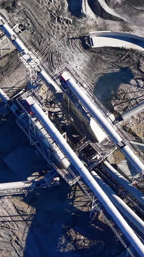 Complex network of industrial conveyor belts. Vertical video. Stock Footage 332346770