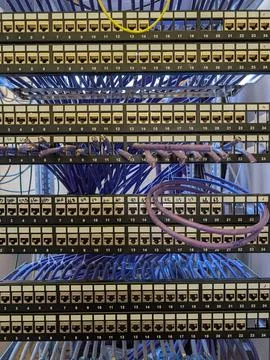 Complex Network Infrastructure with Vibrant Ethernet Cabling Stock Photos