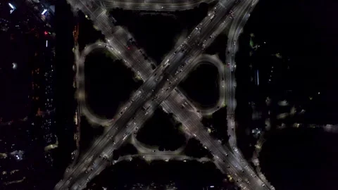 Complex Night Freeway Interchange With Continuous Traffic Flow, Overhead Stock Footage 345268422