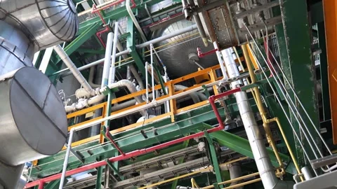Complex oil and chemical processing facility with dense pipe networks, industria Stock-Footage 343904492