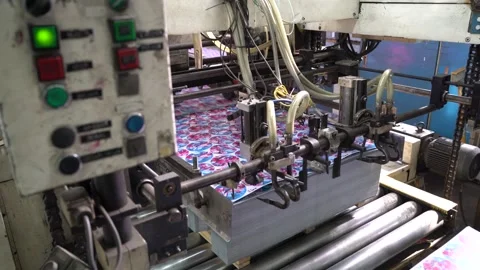 A complex printing process on an industrial machine in a factory. Industrial Stock Footage 332227659