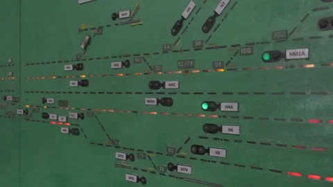 A complex railway traffic control panel with various switches and buttons. Stock-Footage 335128379