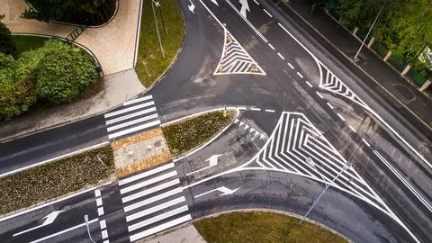 Complex Road Intersection Featuring Multiple Lanes and Pedestrian Crosswalks in Stock Photos