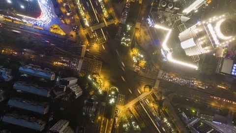 Complex Road Intersection in Shanghai, China at Night. Aerial Hyper Lapse Stock Footage 109138063