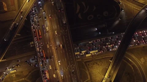 Complex road junction from above. Unique night aerial drone flight. Stock-Footage 65751905