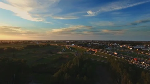 Complex road junction. Sunny day, sunset. Modern Europe. Aerial high altitude Video stock 94130451