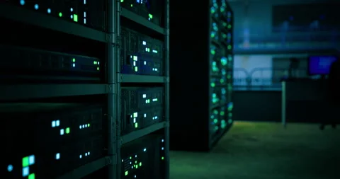 Complex server room with illuminated hardware and high tech atmosphere Stock Footage 308374154