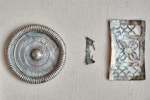 Complex of silver decorations of horse harness XI centuries. Treasure of silv Stock Photos