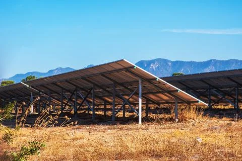 A complex of solar panels for generating electricity. Green energy farm Stock Photos