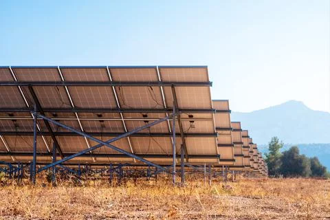 A complex of solar panels for generating electricity. Green energy farm Stock Photos