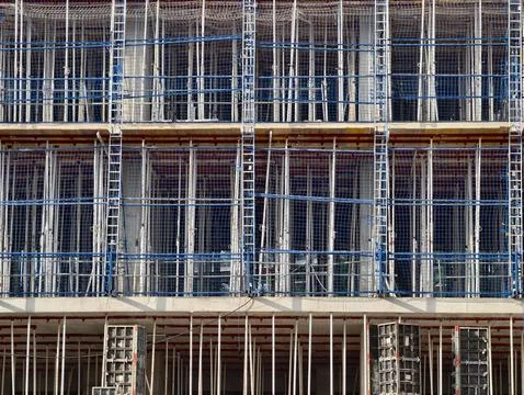Complex structural framework, closeup of scaffolding with repetitive safety.. Stock Photos