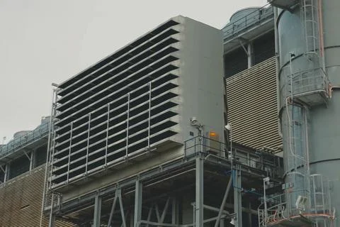 A complex system of pipes and assemblies in a plant for the production and tr Stock Photos