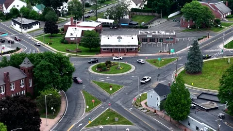 Complex town center roundabout with traffic, East Longmeadow Stock Footage 336982270