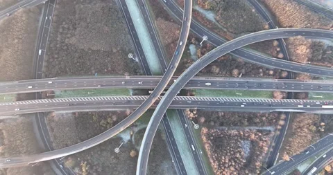 Complex traffic intersection roundabout. Symbolic for choice, direction, route Stock Footage 228670800