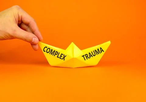 Complex trauma words symbol. Concept words Complex trauma on beautiful yellow Stock Photos