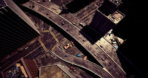 Complex urban intersection shows vehicles navigating through city streets Stock Illustration