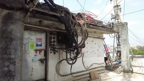Complex wiring structure telephone booth that has a number of connecting cables. Stock Footage 197010631