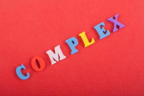 COMPLEX word on red background composed from colorful abc alphabet block wo.. 写真素材