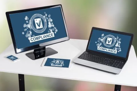 Compliance concept on different devices 库存照片