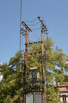 Complicated connection on a pillar with high voltage transformers Stock Photos