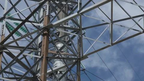 Complicated metal structure of electrical power line tower Stock Footage 143308492
