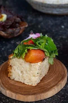 Compliment from chef in restaurant amuse-bouche with homebaked bread biscui.. 库存照片