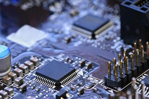 Components on board. PCB to PC. Chip, capacitor and connectors on the motherb Stock Photos