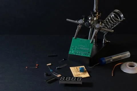 The components of the main board in the process of assembling the device Stock Photos