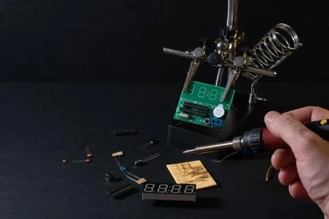 The components of the main board in the process of assembling the device Stock Photos