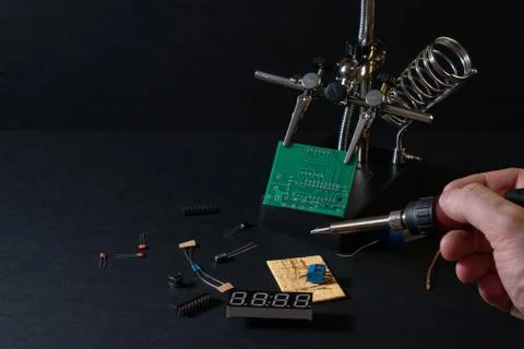 The components of the main board in the process of assembling the device Stock Photos