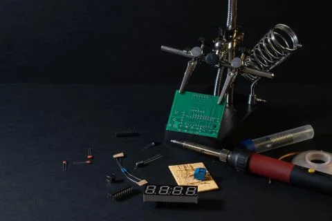 The components of the main board in the process of assembling the device Stock Photos