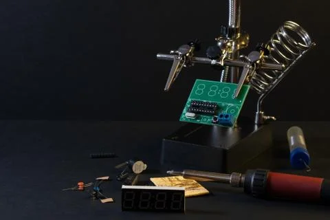 The components of the main board in the process of assembling the device Stock Photos