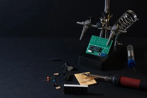 The components of the main board in the process of assembling the device Stock Photos