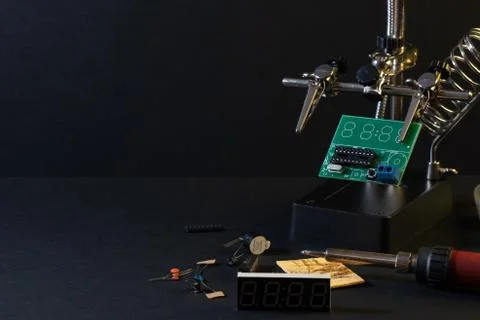 The components of the main board in the process of assembling the device Stock Photos