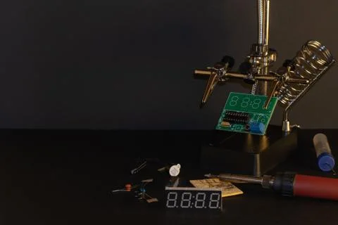 The components of the main board in the process of assembling the device Stock Photos